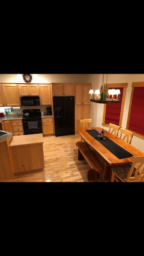 Second floor kitchen with dining area.