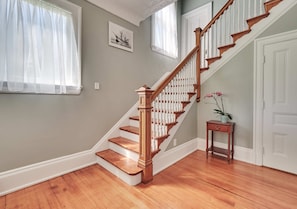 The grand staircase as you enter the home.  All bedrooms are on the second floor