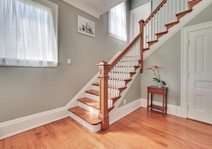The grand staircase as you enter the home. All bedrooms are on the second floor