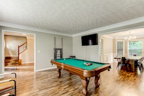Game room with pool table, connect four and 50" TV