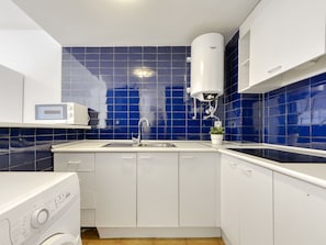 Tap, Cabinetry, Plumbing Fixture, Kitchen Sink, Property, Sink, Countertop, Building, Kitchen, Purple
