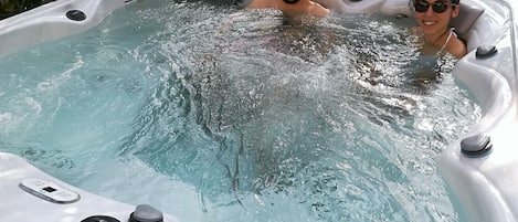 Very large, heated jacuzzi, with lights and music, operating all year round