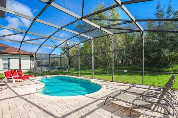 Peaceful pool area with conservation view