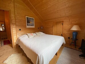 cozy bedroom 4 with queen sized bed 