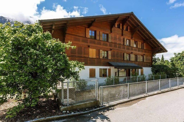 the beautiful chalet on a sunny summer day 