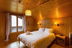 Have a nice rest in the wooden bedroom 1 with double bed!