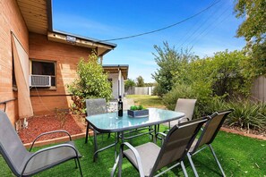 Secure Backyard, We are Dog Friendly!