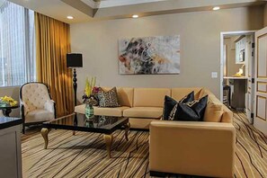 Separate living room with its own 60 inch HD flat screen and quality couches