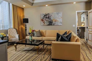 Separate living room with its own 60 inch HD flat screen and quality couches