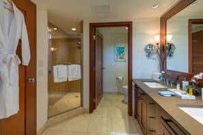 Master Bathroom with soaking tub, walk in shower, and double vanities. 