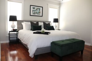 Shown is the master bedroom with soft sheets and luxury pillows. 