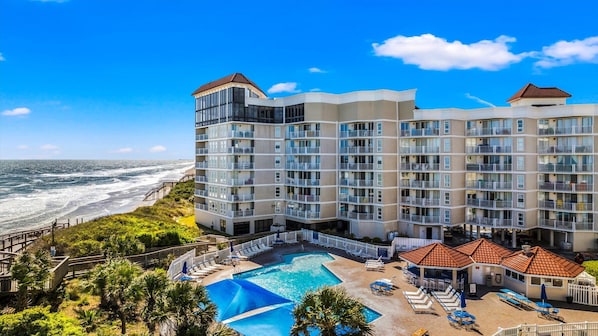 Charming beachfront condo with resort-style amenities.