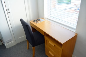 Desk area in the side bedroom