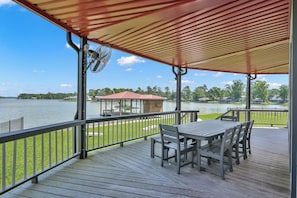 A second waterview deck with dining table