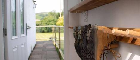 Walking boots hanging in the porch