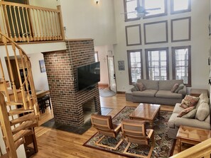 Living Room with Lake View and Main Porch Access
