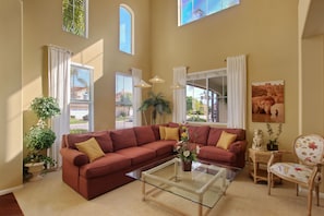 Relax beneath high ceilings in Formal Living Room which provides ample seating