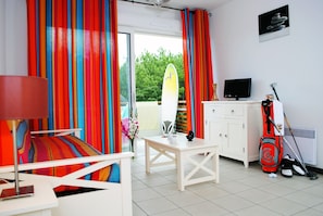 Sink into the cozy sofa after a day exploring the area.