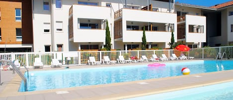 Get some sun in the outdoor pool.