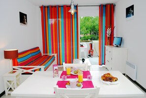 Share meals and laughs at the dining table.