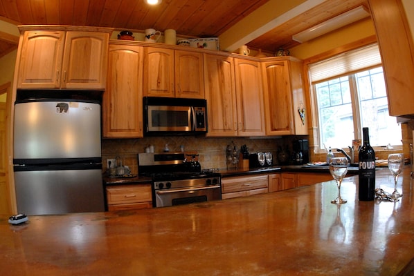 Kitchen with sit down counter that seats 3