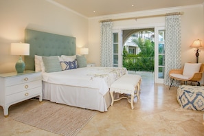 Schooner Bay 205 - Master bedroom, enjoy views of the pool and beach beyond