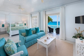 The amazing master bedroom with stunning ocean views and a private patio