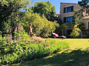 View of the house from the garden showing the pantry terrace grassed area