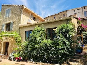 The house is an old stone farm house conversion opposite the village Remparts