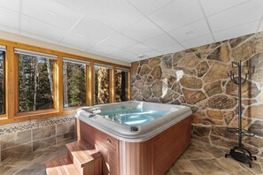 Indoor private hot tub.