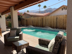 Relax in our pool with sprinklers!