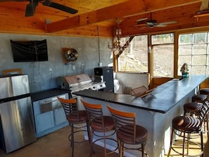 Outside Kitchen with lots of sitting area