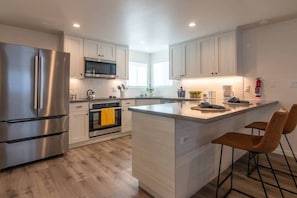 Prepare your best meals at our spacious kitchen equipped with state-of-the-art appliances.