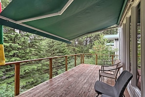 Cool off on the patio under the retractable awning and look out at wild Alaska