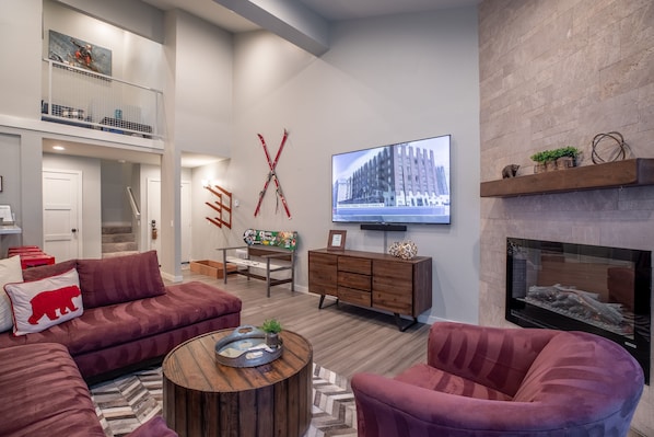 Huge sectional couch, 75" 4K TV, Sonos soundbar, Netflix, Hulu, Amazon and cable