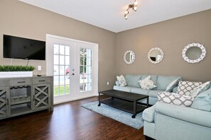 Spaced living room with Ikea sofa and smart tv with a view!