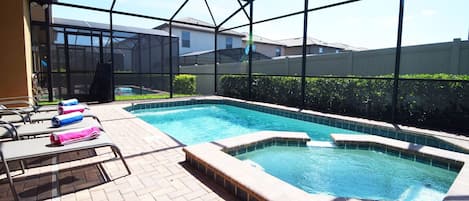 Beautiful private pool with dining area and loungers