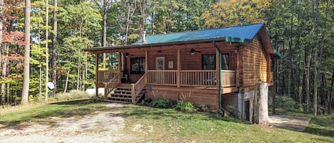 Captivating Cabin Front View with a Spacious Covered Porch