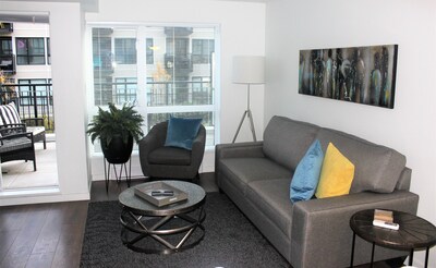 Modern Downtown Condo with Large Sunny Patio