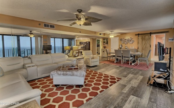 Living Room/ Dining Room Area combined direct view & patio access to the beach.