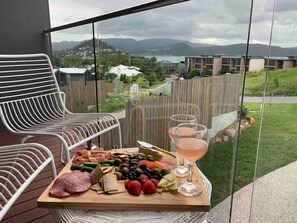 Relax at the end of a day of exploring with balcony views across Whisper Bay