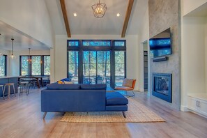 Great room with a wooded view.