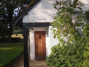 solid oak private front door very close to private parking area