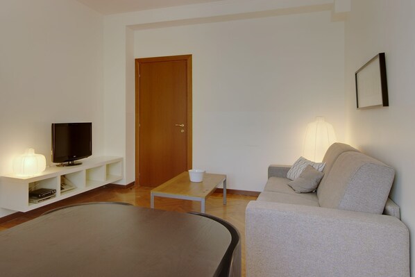 Sink into the cozy sofa after a day exploring the area.