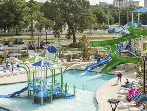 Outdoor pool with lazy river and slide