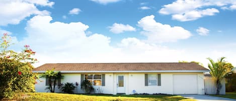 Front of house, front lawn and driveway