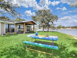 Enjoy a picnic at the lakehouse on the banks of Lake Buchanan. This pic shows the main house covered patio.