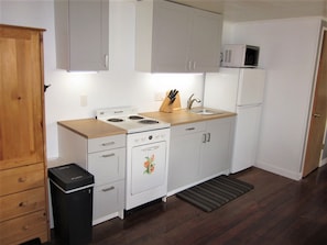 Kitchen is small but efficient. We even have under cabinet lighting!