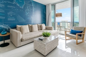 Relaxing living area with direct access to the balcony, where you will have one of the most amazing views from the building.
