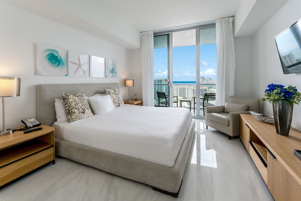 Luxurious One Bedroom Apartment with King size bed and marble floors. Master Bedroom includes LED TV, marble floor balcony and walk-in closet.